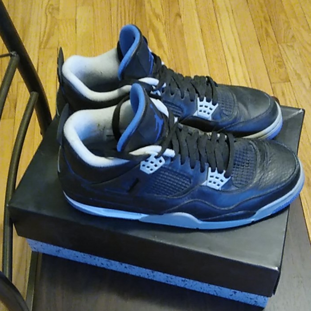 Slightly used Black and gray Retro Air Jordan 4